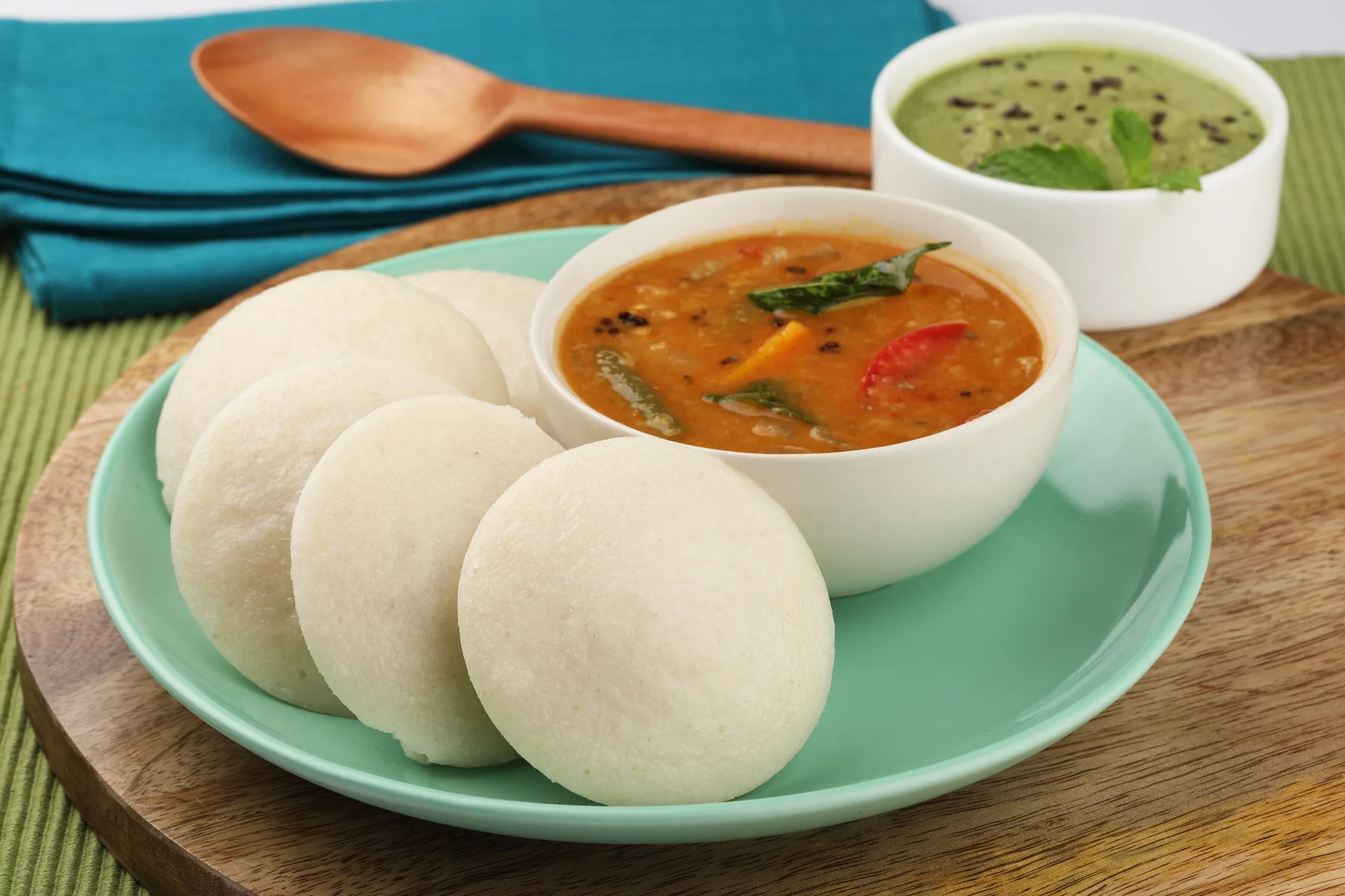 Idli served with sambhar and coconut chutney, a South Indian favourite
