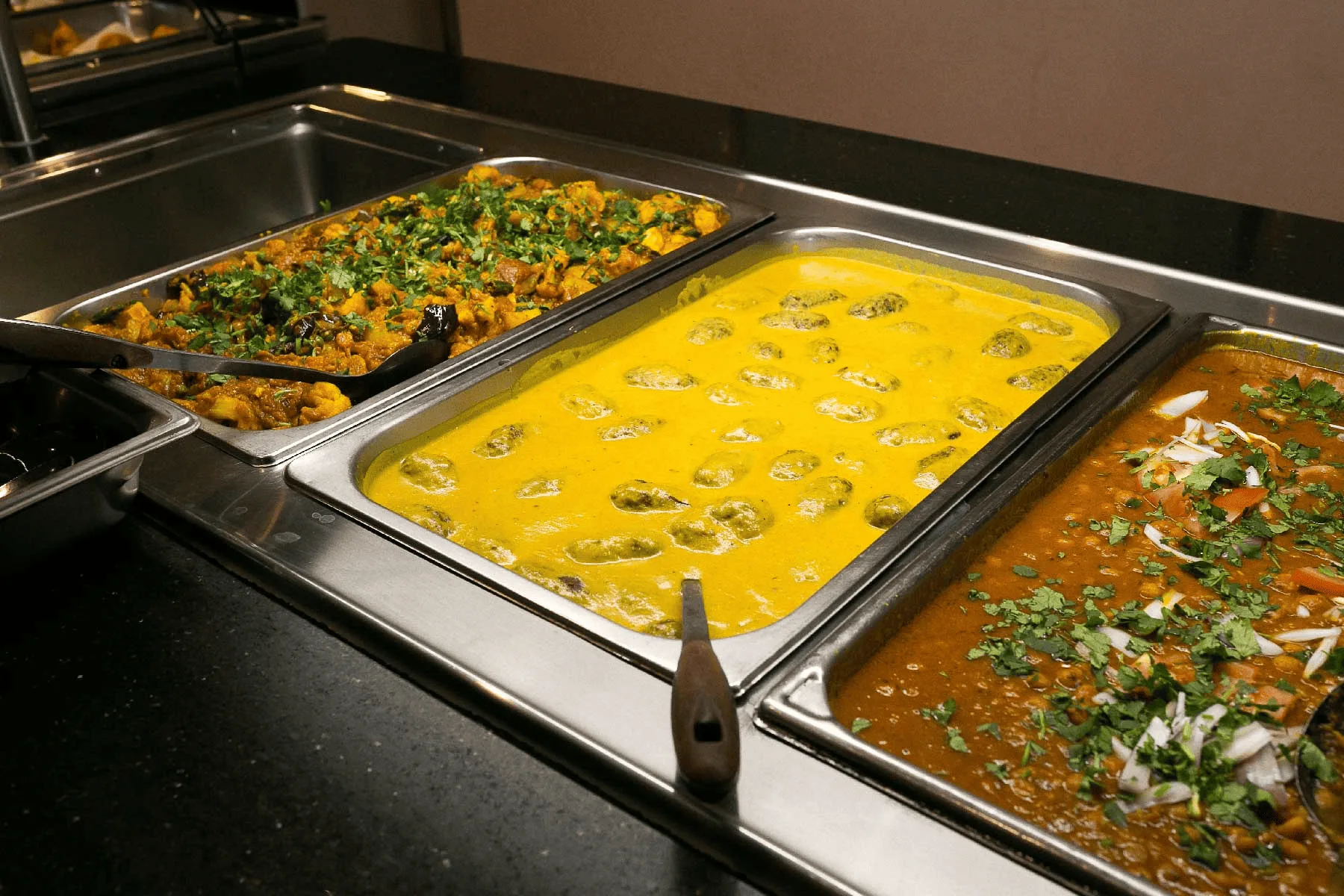 Affordable Indian catering menu featuring vegetarian dishes and sharing platters