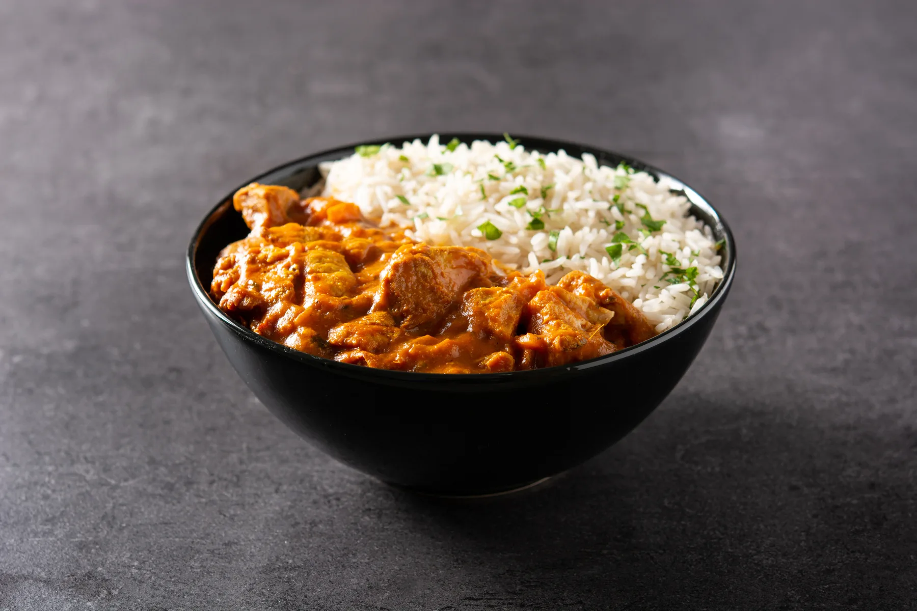 Chicken korma with tender chicken in a mild, creamy sauce