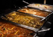 Indian curry gravies in serving pots